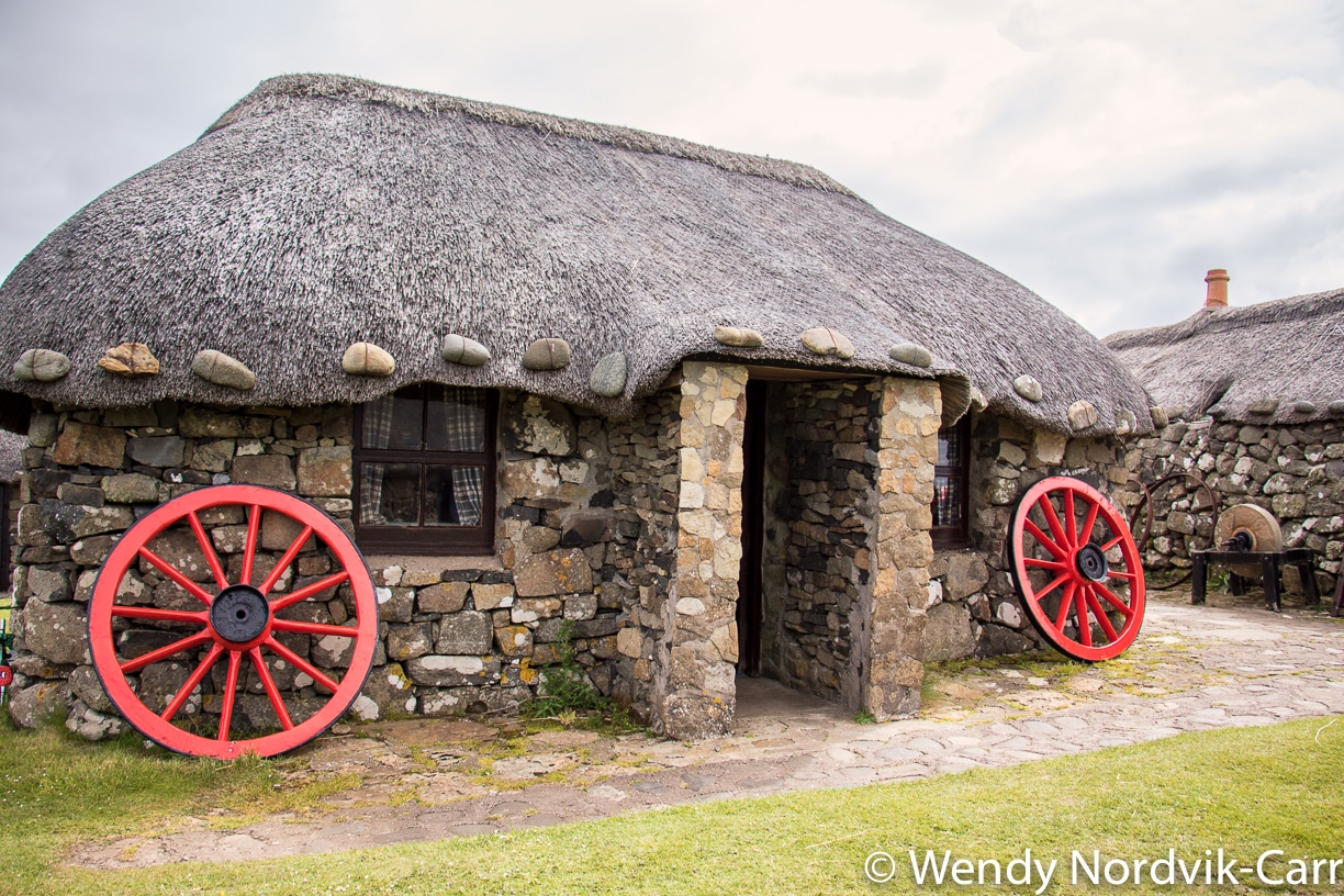 Life on the Isle of Skye Scotland is demonstrated at the 19th-century Highland crofting village of the Isle of Skye Museum of Island Life. This incredible 19th century crofting village museum shows how crofters lived on the Isle of Skye 100 years ago. It is situated in an ideal location and has sweeping views of the ocean below. A croft is a small area of enclosed land used for farming purposes and is unique to northern Islands, Highlands and Hebrides of Scotland. Photo Credit: Wendy Nordvik-Carr